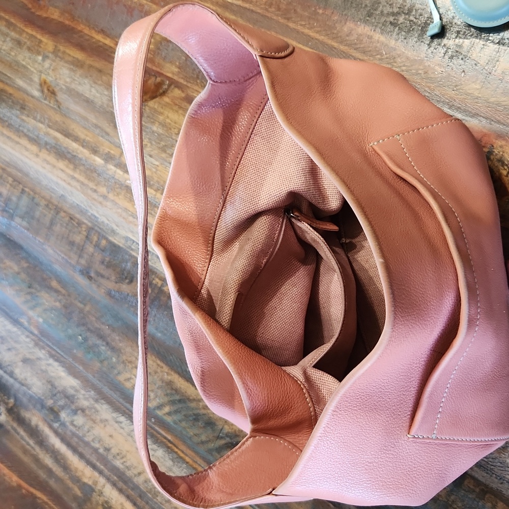 Pretty Salmon colored Dooney and Bourke purse.